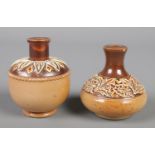 Two miniature Doulton Lambeth vases. 6cm and 5.5cm.