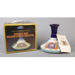 A boxed and sealed bottle of Pusser's British Navy Rum, in ceramic Wade bottle. 1L, 95.5 proof.