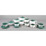 A small collection of Denby ceramics in the 'Greenwheat' pattern. To include teapot, cups and