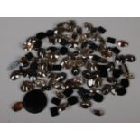 A quantity of assorted faceted & polished beads. To include smokey quartz coloured etc