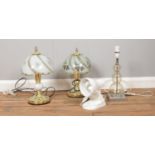 A quantity of assorted table lamps. To include two brass lamps with shades.