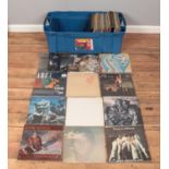 A large storage box containing a good collection of rock and pop vinyl records. To include ABC,