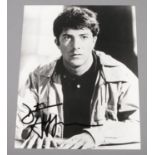 Dustin Hoffman, autographed monochrome photograph, (25.5cm x 20.5cm)