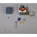 An assortment of jewellery and accessories. To include two sterling silver necklaces, a boxed