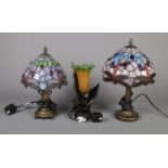 Three decorative desk lamps. To include two small Tiffany style lamps with dragon fly design and a
