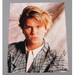 River Phoenix, autographed coloured photograph, (25.5cm x 20.5cm)