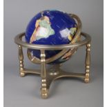 A large Gemstone Globe depicting the countries of the World in minerals and semi -precious stones.