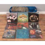 A large storage box containing a good collection of rock and pop vinyl records. To include New