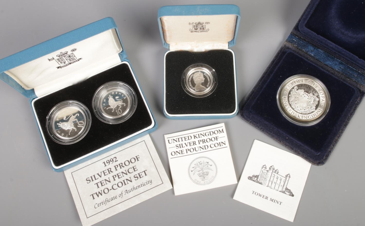 Two Royal Mint silver coins along with a Tower Mint example. Including 1992 Silver proof Ten Pence