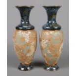 A pair of Doulton Slaters Patent vases. 25cm. One with drill hole near base.