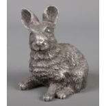 A hallmarked silver covered rabbit figure. ( 6.5cm height) 80g.