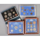 Four coin sets. Including British Silver Coin stuck in .500 fine silver, Great Britain The Coinage