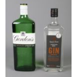 Two sealed bottles of London Dry Gin, including 1L Gordons.