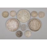 A small collection of silver coins. To include three half crowns (1897, 1916 & 1936) and seven three