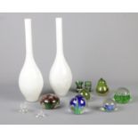 A small quantity of glass ware. To include paperweights, a pair of vases (40cm) etc