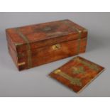 A large brass bound rosewood writing slope for restoration, along with a similar book cover.