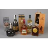 Seven sealed bottles of assorted alcohol, to include cased Sandeman 1981 port, Lepanto brandy and