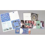 Two Royal Mint coins along with a European Community Coin Collection. Including 2012 Britannia Â£2