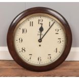 A Smiths 8 day Oak cased wall clock. 39cm diameter. working with key
