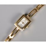 A ladies yellow metal Sekonda quartz wristwatch, set with small diamond highlights to the corner