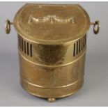 A twin handled brass coal bucket. With swag and bow decoration.