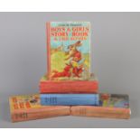 Five volumes of Enid Blyton's 'Boys' & Girls' Story Book; Volumes 1-4 and 6, published by the News