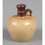 A miniature Doulton Lambeth beer flask. The base stamped 6217. 5cm.
