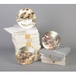 Eleven boxed cabinet plates. To include Royal Doulton and Wedgwood examples. All plates come with
