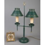 A green painted metal table lamp, together with Staiger quartz carriage clock.