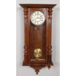 A 19th century walnut Vienna twin weight wall clock. Some parts missing.