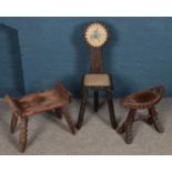 Two wooden stools and a three leg chair. Including fur studded top example, etc.