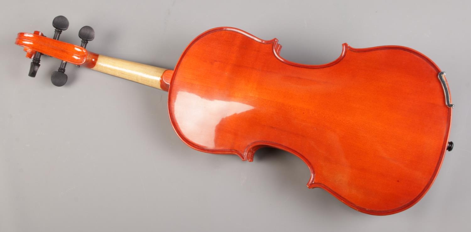 A cased violin and bow, with makers mark for Palatino. - Image 3 of 3