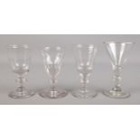 Four Victorian drinking glasses.