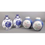 Two pairs of oriental style vases. To include a pair of blue and white vases and two lidded