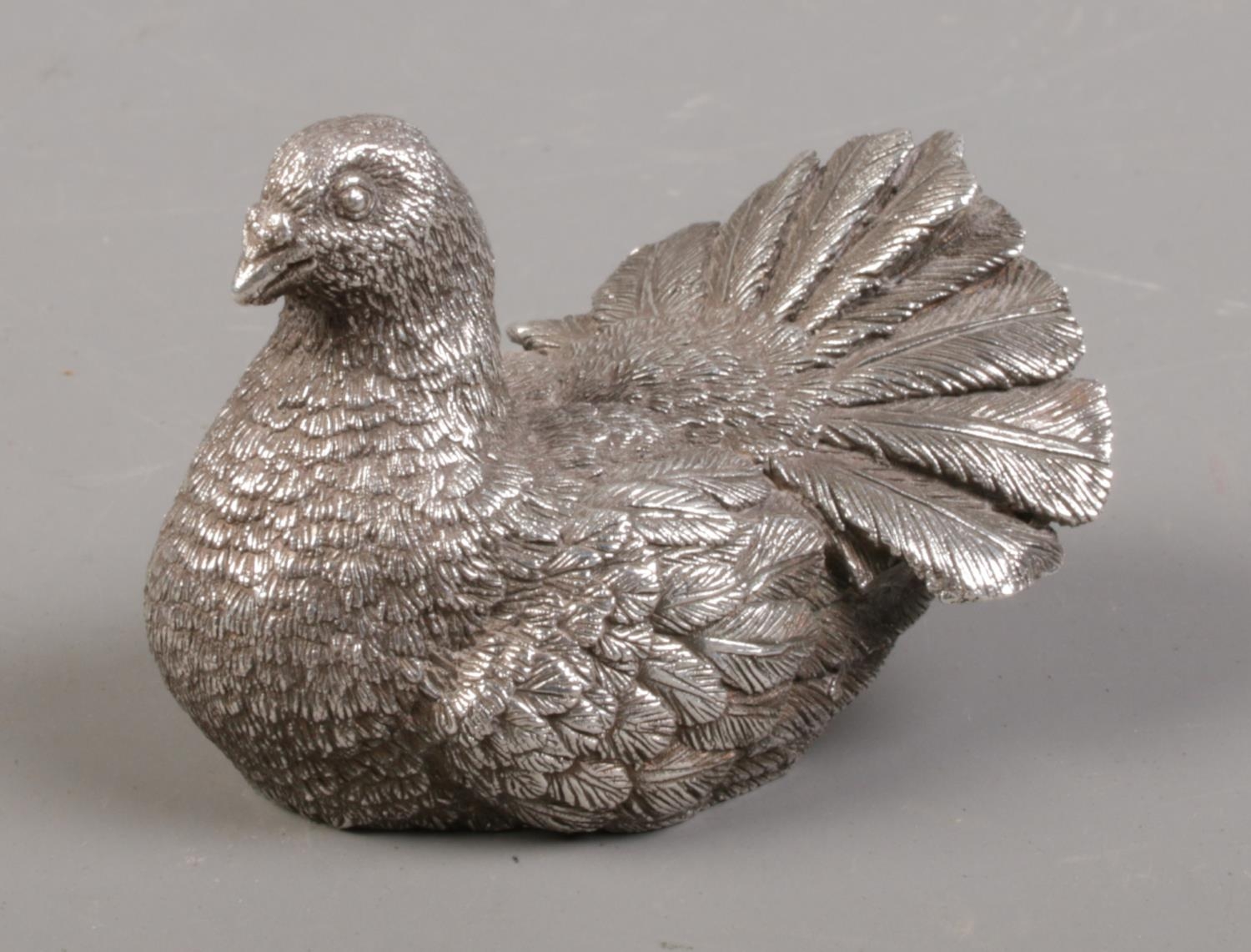 A silver covered model of a turtle dove. Import marks for London. 49g.