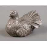 A silver covered model of a turtle dove. Import marks for London. 49g.
