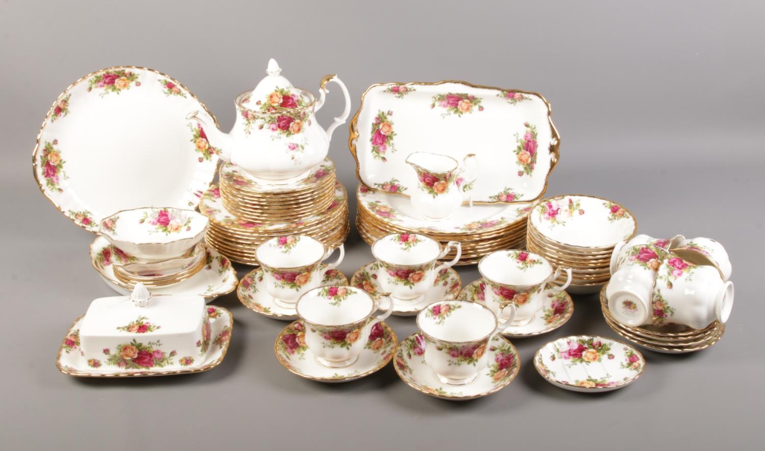 A sixty five piece Royal Albert 'Old Country Roses' dinner/tea set. To include tea pot, salad