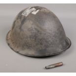 A WWI brodie helmet.