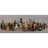 A quantity of assorted alcohol miniatures. To include Malibu, Baileys, Archers, Smirnoff, Ouzo,