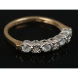 A 10ct gold aquamarine & diamond ring. Size M. 1.72g.