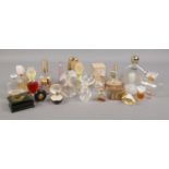 A collection of glass scent bottles. Includes Lalique Nina Ricci example, Hermes, Christian Dior