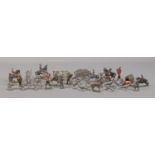 A collection of vintage lead and metal figures, including farmyard animals and soldiers.