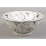 An early 19th century Chinese blue and white bowl from the Tek Sing cargo, bearing Nagel Auctions