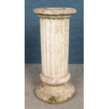 A large Corinthian garden column, with stepped base. Height: 78cm, Diameter of top: 34cm. Heavy