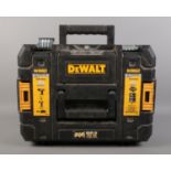 A cased Dewalt cordless power tool kit. Drill DCD776 and screwdriver DCF885. Comes with charger