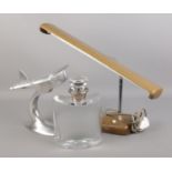 A Trident desk lamp along with a cast metal aeroplane model and a LSA International glass decanter.