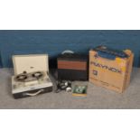 A boxed Raynox 8mm projector and a vintage Fidelity Playmaster reel to reel tape recorder.
