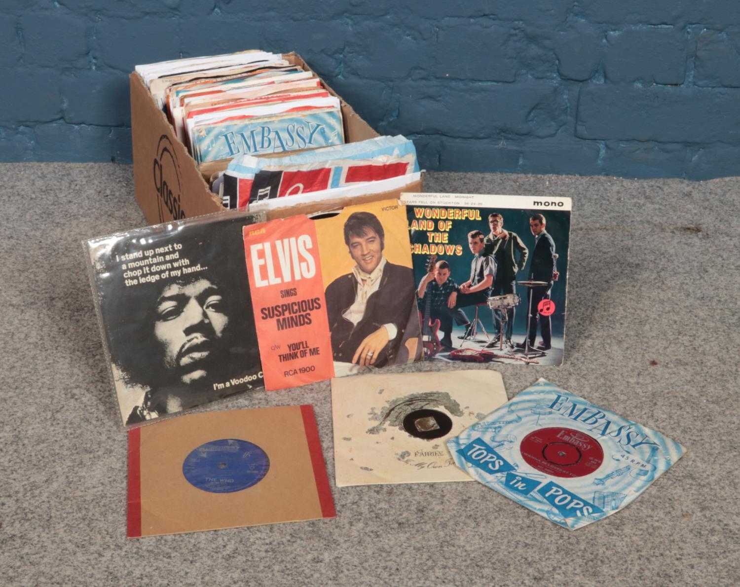 A box of 1960's 45rpm vinyl records. Artists to include The Rolling Stones, The Beatles, The Who,