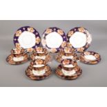 A Royal Albert 'Heirloom' pattern part tea set. To include five cups, six saucers, six side plates