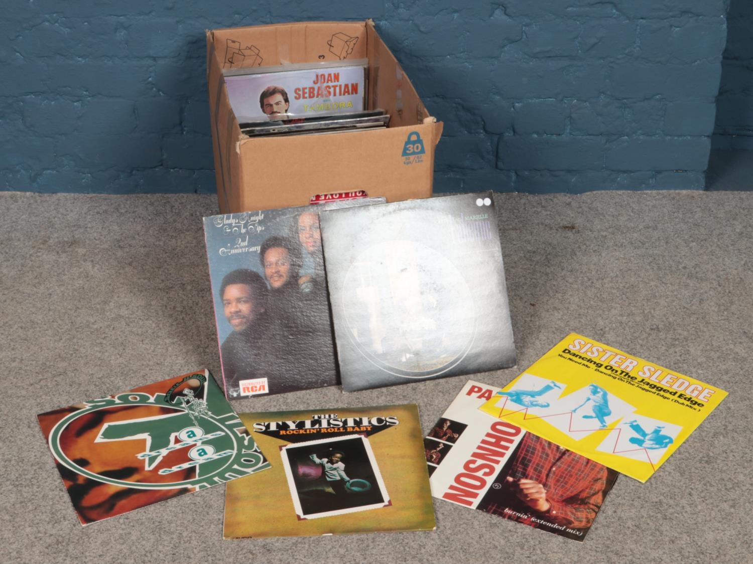 A box of assorted vinyl records. Artists to include The Stylistics, Frank Sinatra, Culture Club,